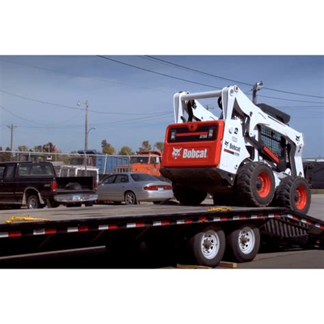 how to load a skid steer on a gooseneck trailer|bobcat skid steer loading.